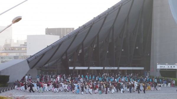 Groups of people practising taichi in front of Yoyogi Stadium at Harajuku, Tokyo, Japan