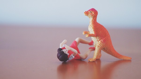 Prehistoric Photojojo toy dinosaur vs Fuchico on the Cup office girl figure